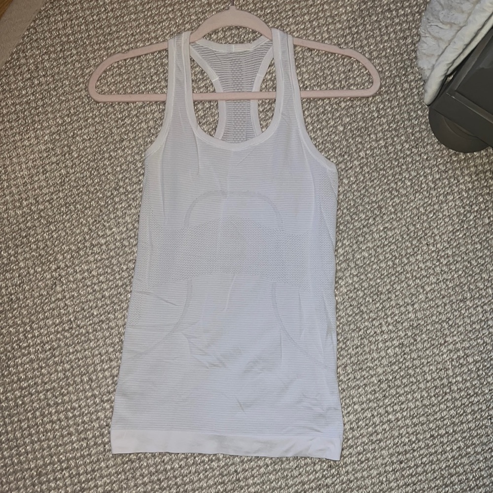 White swiftly tech size 4 tank